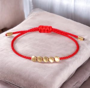 Bőség és szerencse – állítható tibeti karkötő - Piros